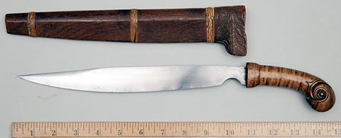 Indonesian Knife with a Parrot Head Hilt and Wooden Scabbard